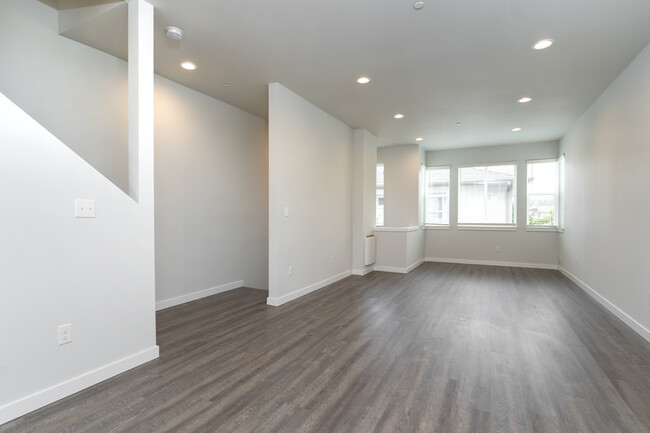 Spacious & Bright Living Room - The Two-Ten Townhomes