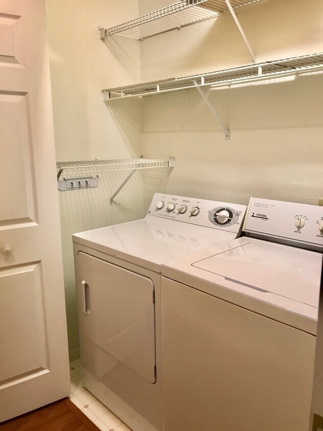 Washer/Dryer in hallway - 10813 Admiral Bend Way