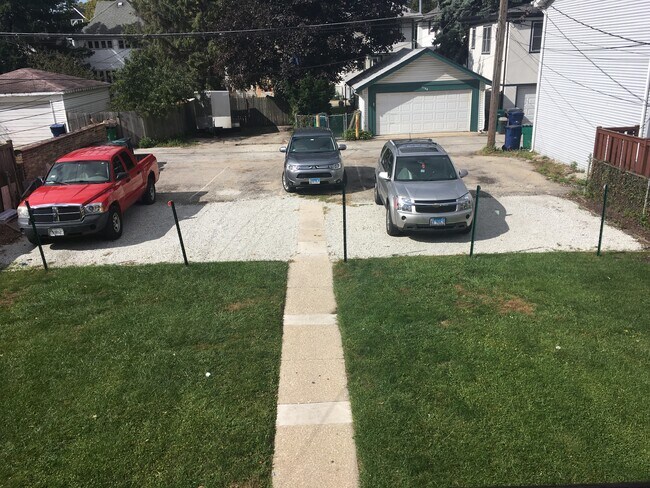 Tandem parking with nice green space. - 1163 S Oak Park Ave