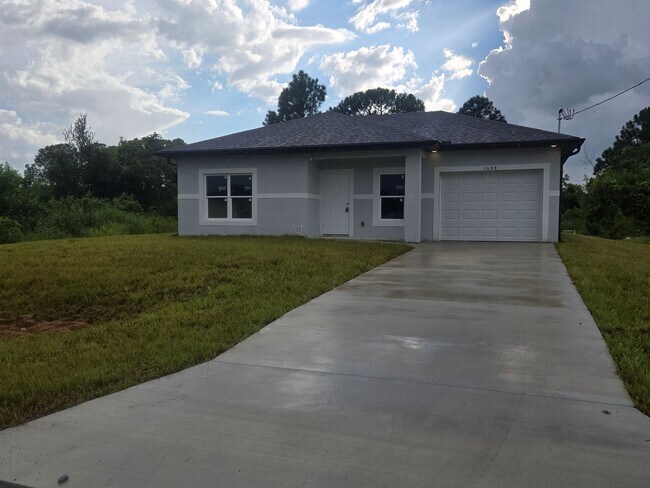Building Photo - Brand New 2/2/1- SW Lehigh Acres