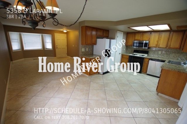 Building Photo - 5358 S Laramie Pl