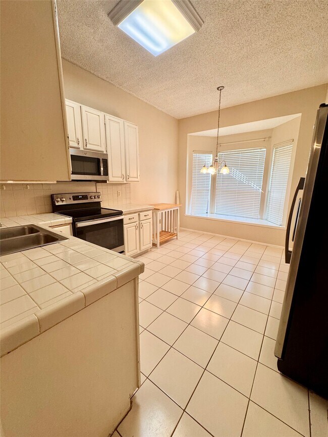 Foto del edificio - 3423 Pecan Point Dr