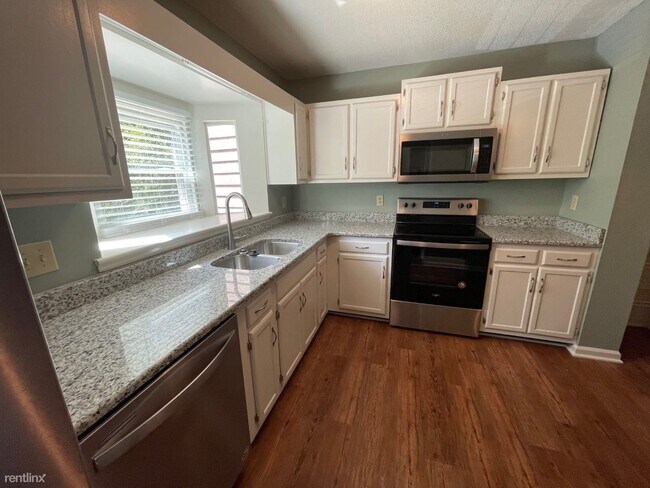 Building Photo - 2 br, 1.5 bath Duplex - 5763 Forest Lawn Ct