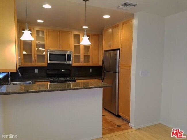 Building Photo - 3 br, 3 bath Condo - 435 S Palm Dr Apt 5