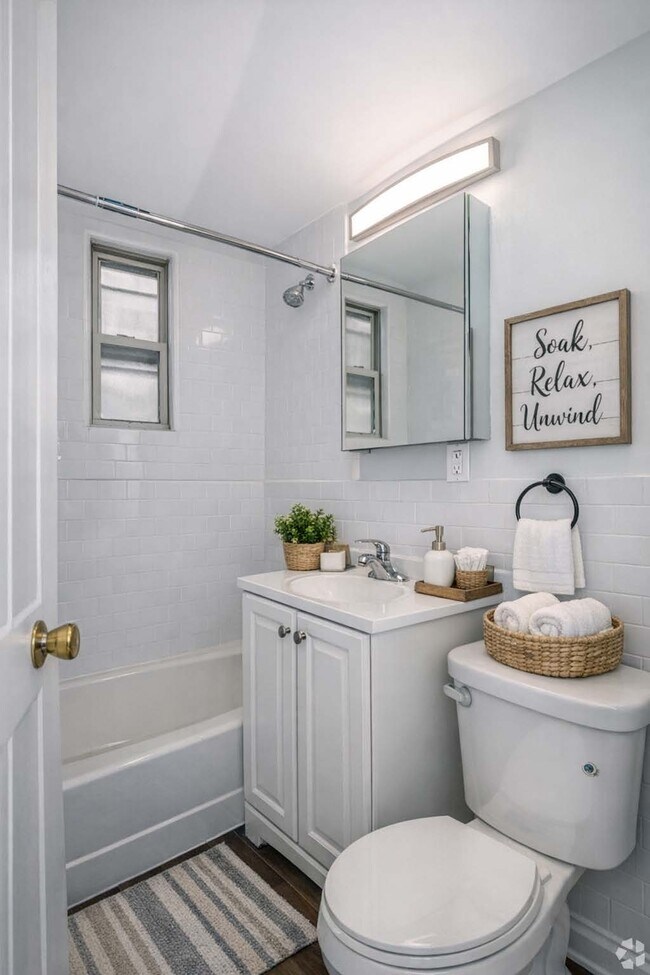 2BR, 1BA - 771SF - Bathroom - Virtually Staged - Elmwood Terrace Apartments