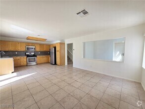 Building Photo - 6993 Troubador Dr