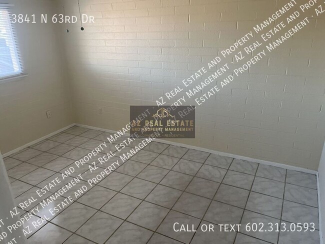Building Photo - 3841 N 63rd Dr
