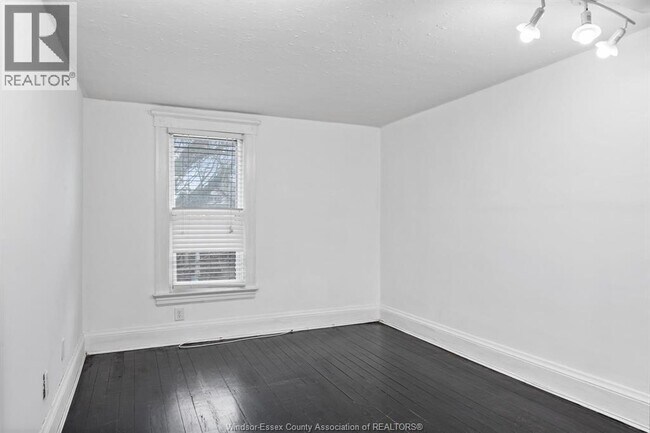 Photo du bâtiment - 835 Moy Ave
