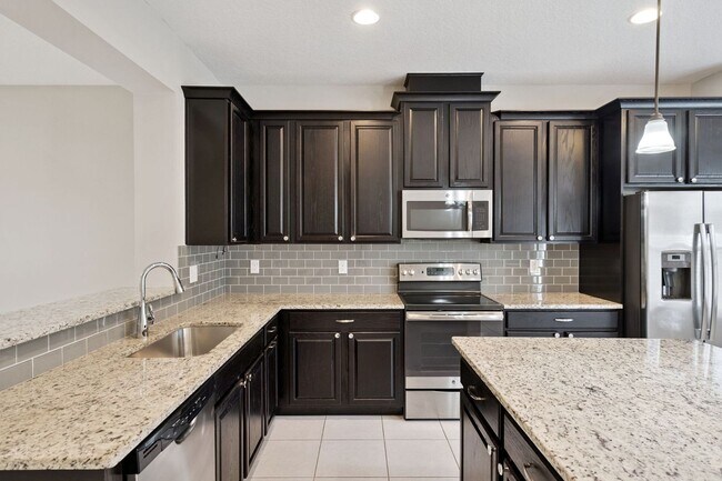Building Photo - AVAILABLE NOW! 3/2.5/2 townhome close to Hamlin Town Center