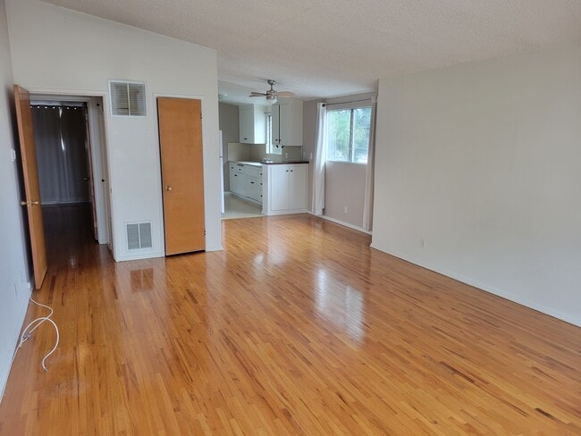 Living room, dining area & kitchen from front door - 2318 10th St