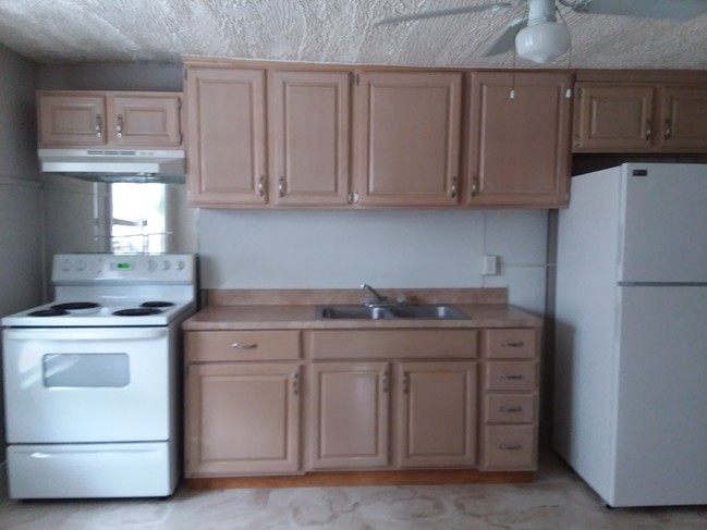 wood cabinetsnew counter top Brand new refrig - 2 Wise Rd