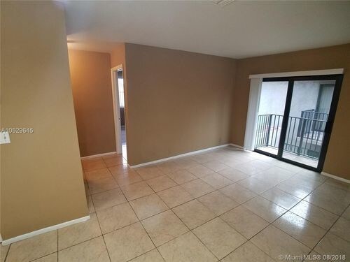 Building Photo - 10624 Royal Palm Blvd