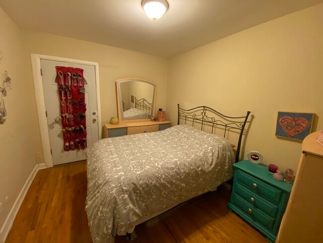 Bedroom, back door to interior deck space/laundry/trash - 1168 N La Salle Dr