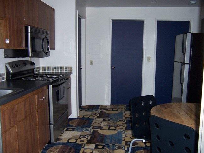 Cocina remodelada - The Villager Studio Apartments