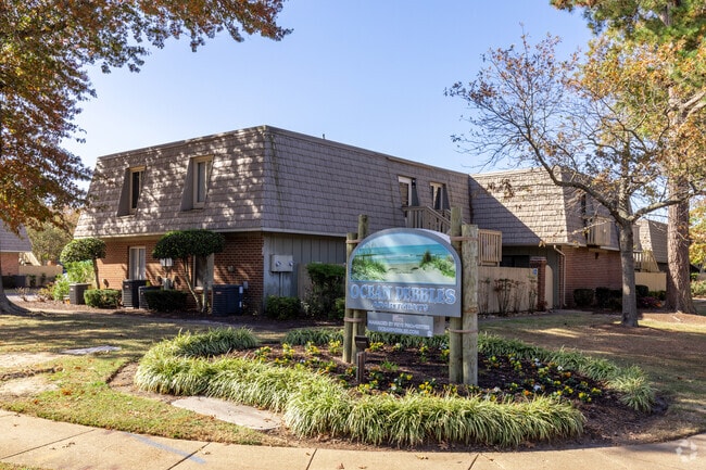 Sign - Ocean Pebbles Apartments