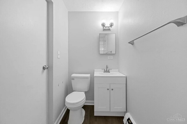 Bathroom sink and toilet - 2338 Kemper Ln