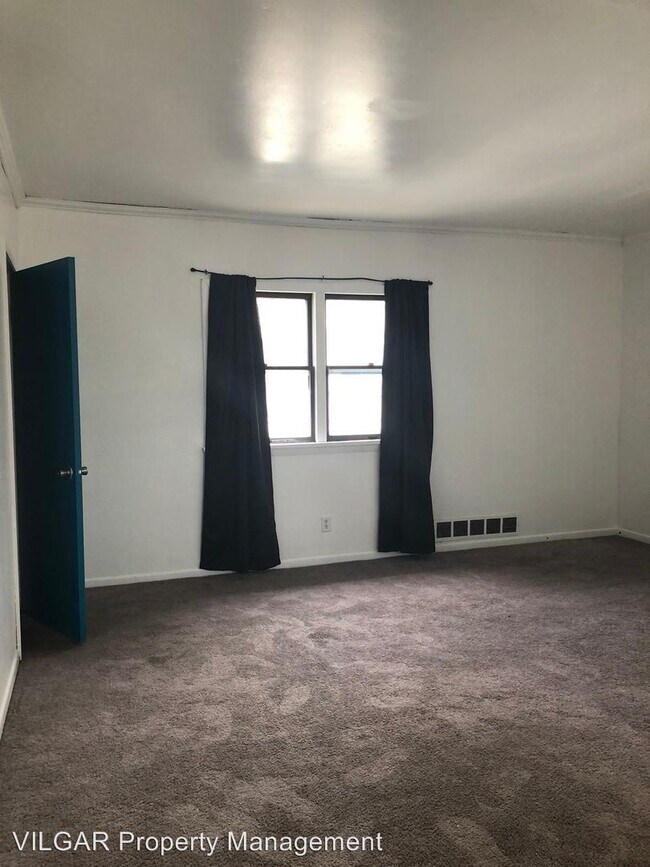 Foto del edificio - 6009 E 6th Pl