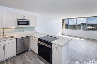 Building Photo - 46-255-255 Kahuhipa St