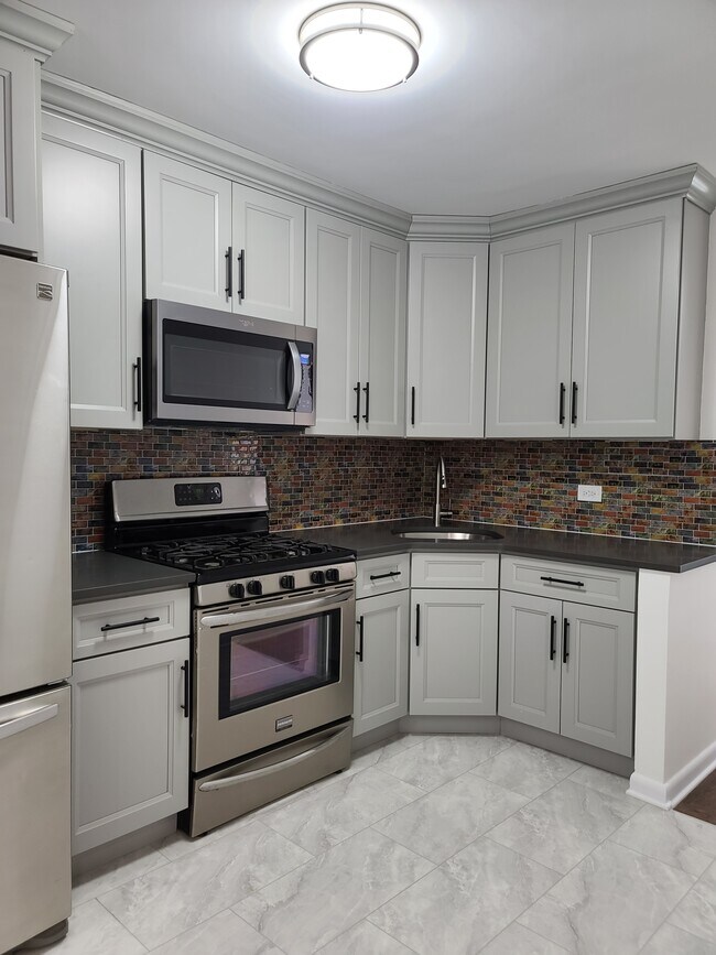 Foto del edificio - 917 E 58th St