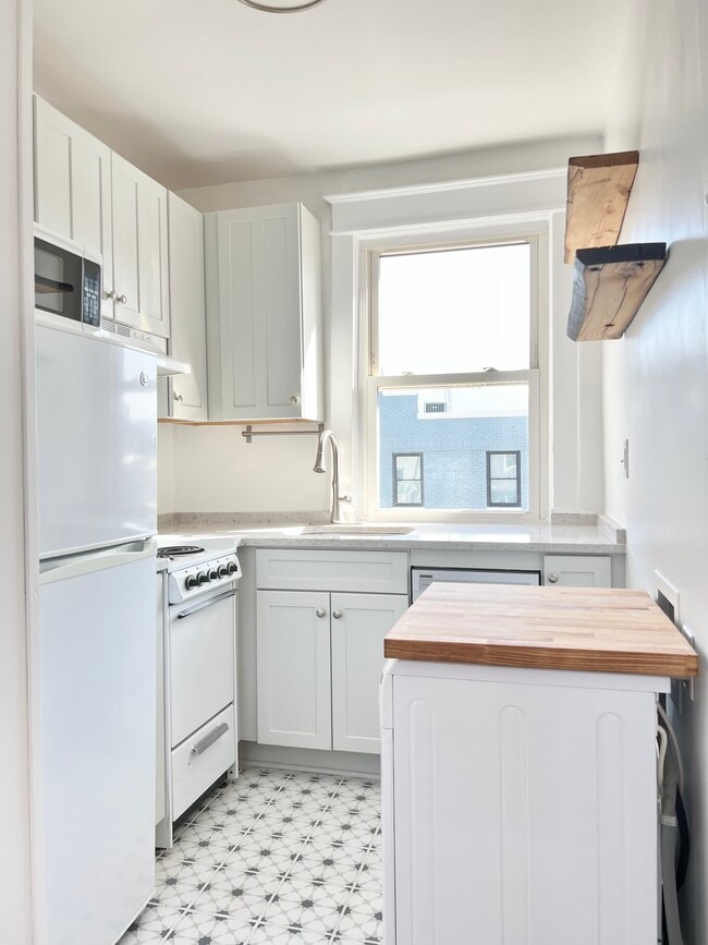 kitchen with butcher block detail over W/D - 1451 Pennsylvania Ave SE
