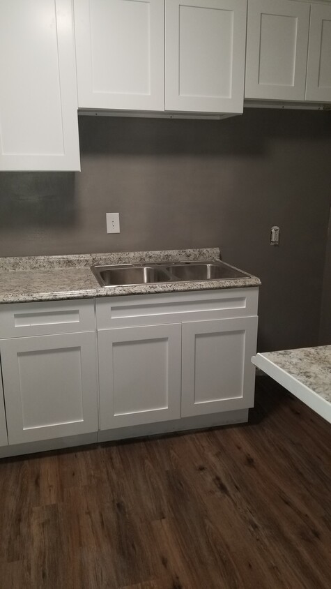 New Kitchen Cabinets and Flooring - 322 W 66th St