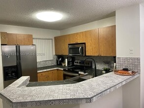 Building Photo - 8750 N Sherman Cir