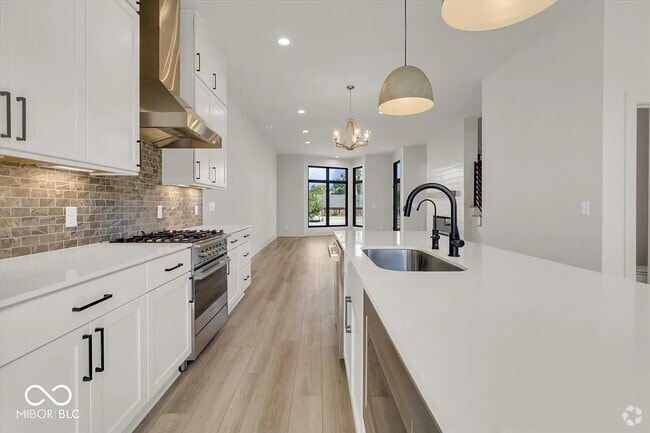 Kitchen dining and living room w/fireplace - 675 E 16th St
