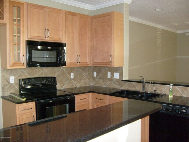 Building Photo - 8853 Shell Island Dr