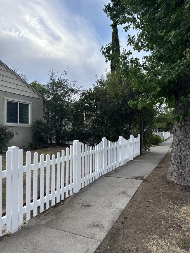 Front yard picked fence - 5775 Bertrand Ave