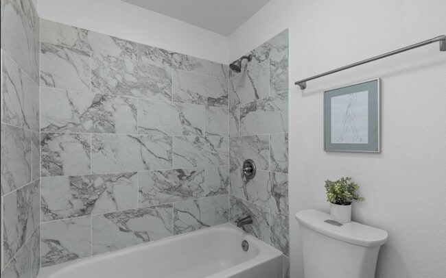 Building Photo - Welcome Home to Light-Filled Comfort in a ...
