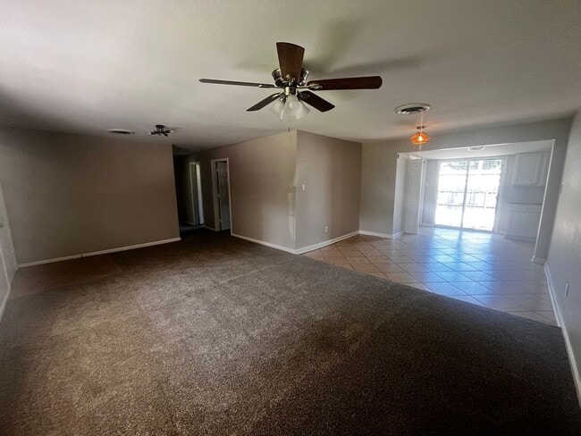 Building Photo - Freshly updated home with privacy fence in...