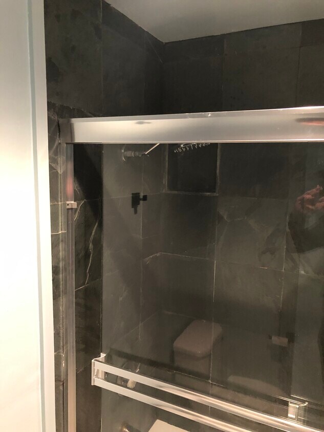 Blue slate shower tile. - 155 Sharene Ln