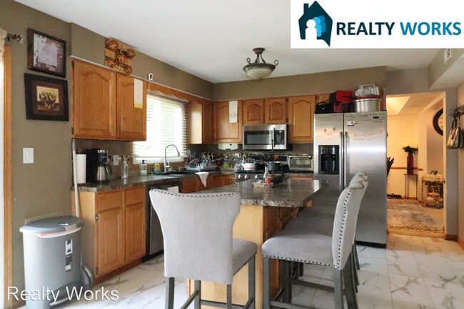 Building Photo - 4 br, 3.5 bath House - 7732 Rutledge Avenue