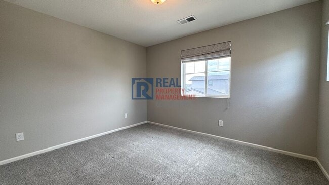 Building Photo - 21371 E 60th Ave