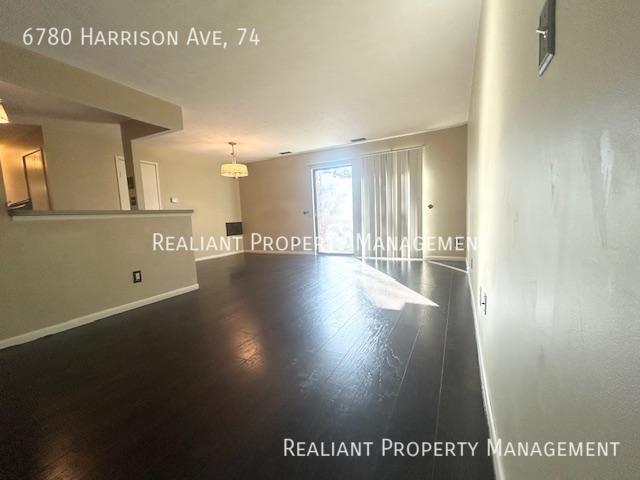 Building Photo - 6780 Harrison Ave. #74