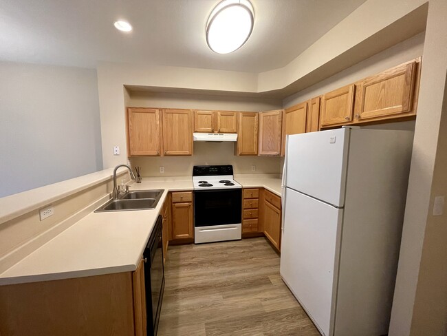 Electric cooking, new sink, faucet and disposal - 5555 E Briarwood Ave