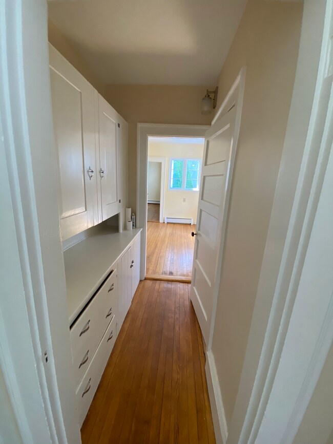 Pass through the butler's pantry with extra storage to reach the kitchen - 1168 Washington St