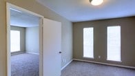 Located at 250 Sage Ave. in Mobile, Alabama, this single-story home offers a straightforward and functional layout designed for comfortable everyday living. The interior features neutral, earthy-toned walls that create a warm and understated atmosphere throughout the space. Soft carpeting covers the floors, adding a layer of comfort underfoot and contributing to a cozy residential feel. The rooms are well-proportioned, with clean white trim and baseboards that provide a crisp contrast to the warm wall tones. Natural light enters through vertical windows fitted with blinds, allowing for adjustable brightness and privacy as needed. The textured ceilings, complemented by flush-mount lighting fixtures, add a classic touch to the interior. Interior doors are finished in white, maintaining a cohesive and clean aesthetic throughout the home. The overall ambiance is calm and move-in ready, with a neutral palette that provides a versatile backdrop for a variety of furnishing styles. Situated in Mobile, AL, this single-floor property offers accessible, ground-level living in a residential neighborhood setting.