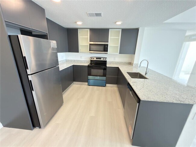 Foto del edificio - 5563 Millennia Park Dr