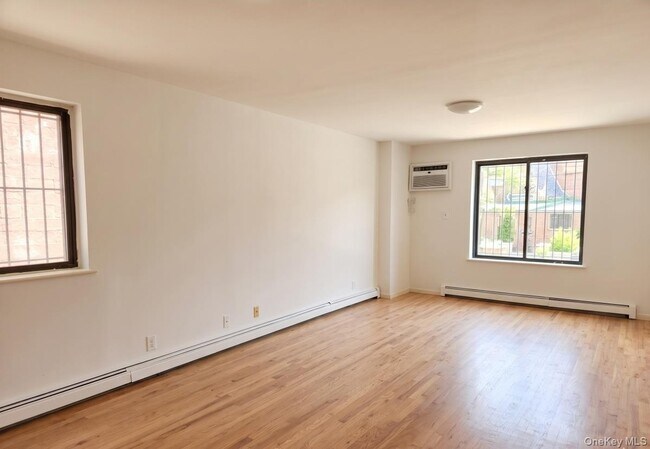 Building Photo - 76-13 46th Ave