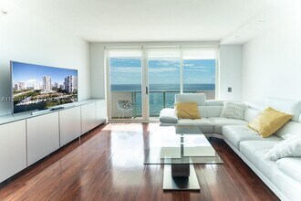 Building Photo - 9499 Collins Ave