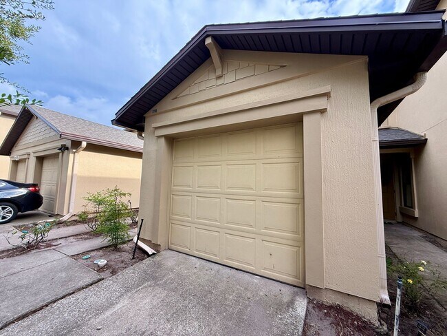 Building Photo - Spacious 2-Bed, 2.5-Bath Townhome with Gar...