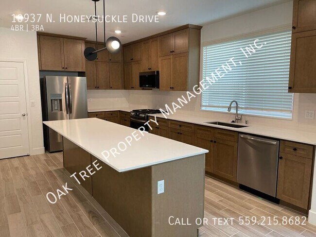 Foto del edificio - 10937 N Honeysuckle Dr