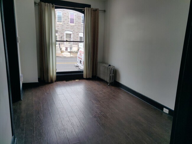 Building Photo - Spacious 2-Bedroom Townhome with Finished ...