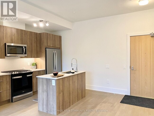 Photo du bâtiment - 495 Logan Ave