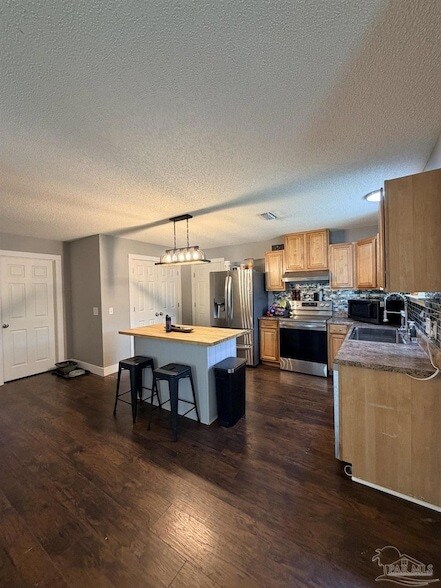 Foto del edificio - 5877 Tryton Cir