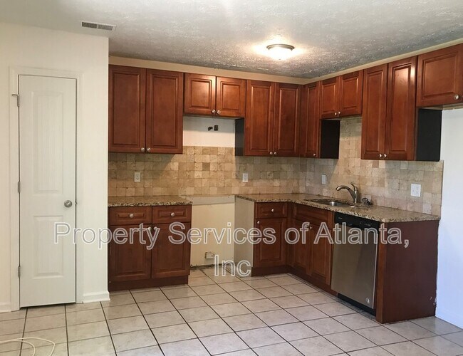Foto del edificio - 8305 Glenwoods Terrace