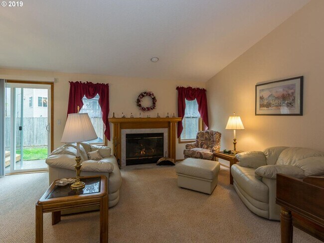 Building Photo - Charming 4-Bed, 2-Bath Home with Vaulted Ceilings, Dual Fireplaces & Serene Outdoor Spaces