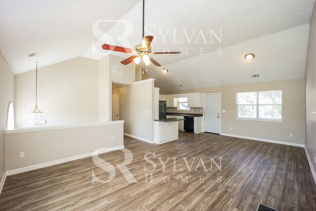 Building Photo - The living is easy in this 3 bedroom, 2 ba...