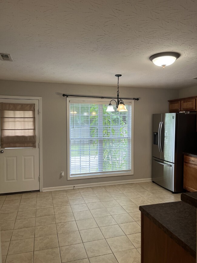 Building Photo - ONE MONTH OF FREE RENT!  "Charming 2-Bed, ...